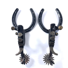 Load image into Gallery viewer, Spur and Horseshoe Gun Holder Rack Hearts St Croix Forge
